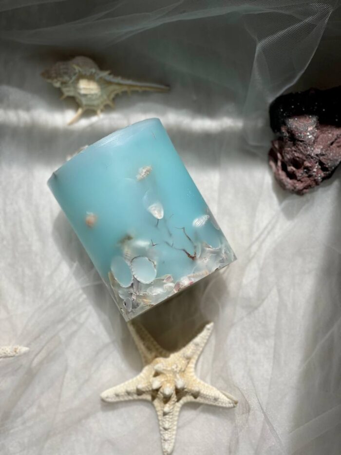 شمع استوانه دریایی با تزیینات صدف و ستاره دریایی